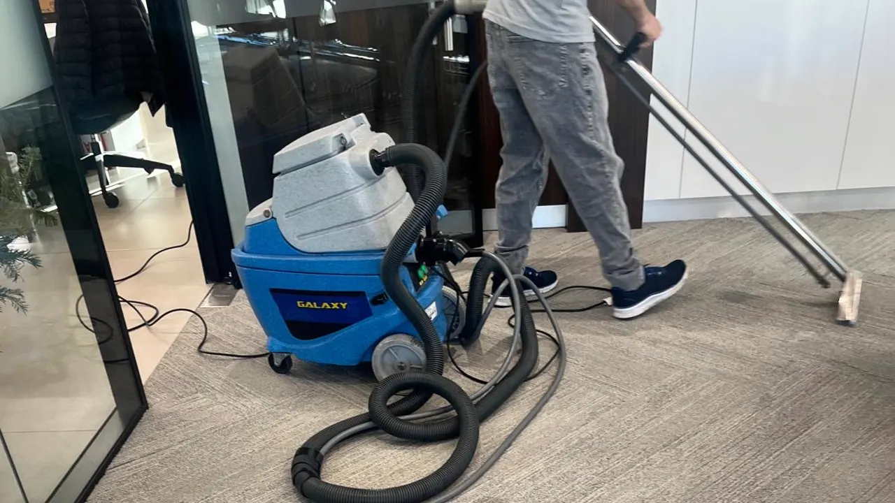 Galaxy extraction machine in use on an office carpet