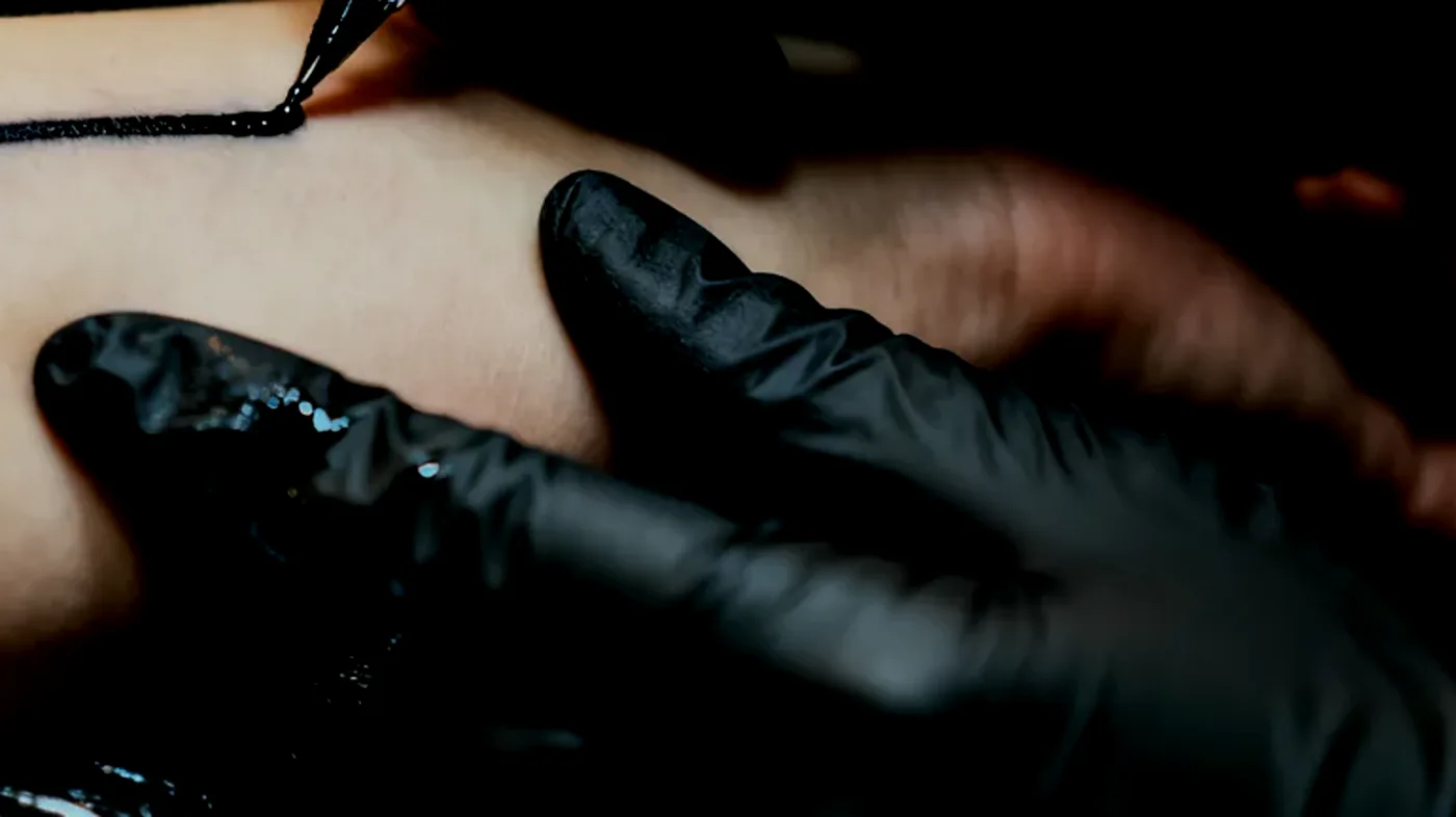 Black tattoo ink, macro